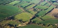 Aerial view of green fields and slopes Royalty Free Stock Photo