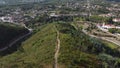 Aerial view of green forest and village. Drone fly over pine trees and rooftops in Central Portugal, Serpins. Flight over woods, n