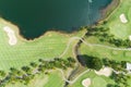 Aerial view of the green golf course in Thailand Beautiful green grass and trees on a golf field with fairway and putting green in Royalty Free Stock Photo