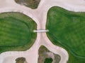 Aerial view of the green grass of the golf course. Bridge between hills Royalty Free Stock Photo