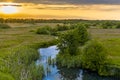 Aerial view of green grassland river valley Royalty Free Stock Photo