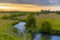 Aerial view of green grassland river valley Royalty Free Stock Photo