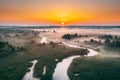 Aerial View Green Meadow And River Landscape In Misty Foggy Morning. Top View Of Beautiful European Nature From High Royalty Free Stock Photo