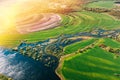 Aerial View Green meadows And River Landscape In Sunny Spring Summer Day. Top View Of Nature, Bird's Eye View. Trees Royalty Free Stock Photo