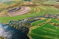 Aerial View Green meadows And River Landscape In Sunny Spring Summer Day. Top View Of Nature, Bird's Eye View. Trees Royalty Free Stock Photo