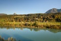 Aerial view of green meadows with villages and forest in austrian Alps mountains Royalty Free Stock Photo