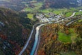 Aerial view of green meadows with villages and forest in austrian Alps mountains Royalty Free Stock Photo