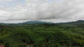 Aerial view of the green rainforest jungle in Asia.