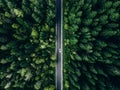 Aerial view green summer forest and asphalt road with car Royalty Free Stock Photo