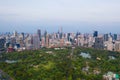 Aerial view of green trees in Lumpini Park, Sathorn district, Bangkok Downtown Skyline. Thailand. Financial district and business