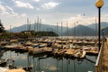 Aerial view of group of empty docked boats in Lake Como in Italy