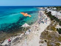 Aerial View of a Group of Kites on Italian Beach in Summer in a Sunny Day on Beach Umbrellas Background Royalty Free Stock Photo