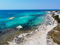 Aerial View of a Group of Kites on Italian Beach in Summer in a Sunny Day on Beach Umbrellas Background Royalty Free Stock Photo