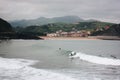 Aerial view of a group of surfers in the ocean on the Cote Basque