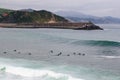 Aerial view of a group of surfers in the ocean on the Cote Basque