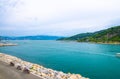 Aerial view of Gulf of Spezia turquoise water, Portovenere town stone promenade quay, Palmaria island Royalty Free Stock Photo