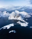 Aerial view on the Hamnoy village, Lofoten Islands, Norway. Landscape in winter time during blue hour. Mountains and water. Royalty Free Stock Photo