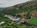 Aerial view of the Hartbeespoort Dam wall in South Africa, with lush greenery in the foreground Royalty Free Stock Photo