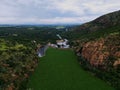 Aerial view of the Hartbeespoort Dam wall in South Africa, with lush greenery in the foreground Royalty Free Stock Photo