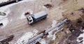 Aerial view of heavy machinery, Articulated truck moving dirt on a new road construction site, heavy equipment top down Royalty Free Stock Photo