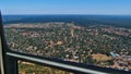 Aerial view from helicopter over famous Victoria Falls town and bush land at the border of Zimbabwe and Zambia. Royalty Free Stock Photo