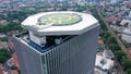 Aerial view of helipad. Helicopter landing pad on rooftop on skyscraper, high-rise office building in Shanghai Downtown