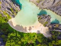 Aerial view of Hidden beach in Matinloc Island, El Nido, Palawan, Philippines - Tour C route - Paradise lagoon and beach in Royalty Free Stock Photo