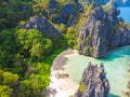 Aerial view of Hidden beach in Matinloc Island, El Nido, Palawan, Philippines - Tour C route - Paradise lagoon and beach in Royalty Free Stock Photo