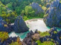 Aerial view of Hidden beach in Matinloc Island, El Nido, Palawan, Philippines - Tour C route - Paradise lagoon and beach in Royalty Free Stock Photo