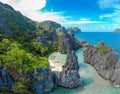 Aerial view of Hidden beach in Matinloc Island, El Nido, Palawan, Philippines - Tour C route - Paradise lagoon and beach in Royalty Free Stock Photo