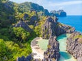 Aerial view of Hidden beach in Matinloc Island, El Nido, Palawan, Philippines - Tour C route - Paradise lagoon and beach in Royalty Free Stock Photo