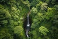 aerial view of a hidden waterfall in dense forest Royalty Free Stock Photo