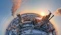 Aerial view from high altitude of little planet earth with cement factory high concrete structure and tower crane at Royalty Free Stock Photo