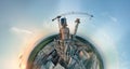 Aerial view from high altitude of little planet earth with cement factory tower with high concrete plant structure at Royalty Free Stock Photo