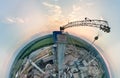 Aerial view from high altitude of little planet earth with cement factory tower with high concrete plant structure at Royalty Free Stock Photo