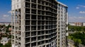 Aerial view of high residential apartment building under construction. Real estate development Royalty Free Stock Photo