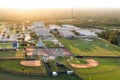 Aerial view of high school open air sports facilities in Florida. American football stadium, tennis court and baseball Royalty Free Stock Photo