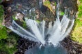 Aerial View of The High Waterfall Jeongbang and Lagoon on Jeju Island Royalty Free Stock Photo