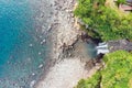 Aerial View of The High Waterfall Jeongbang and Lagoon on Jeju Island Royalty Free Stock Photo