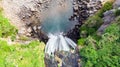 Aerial View of The High Waterfall Jeongbang and Lagoon on Jeju Island Royalty Free Stock Photo