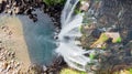 Aerial View of The High Waterfall Jeongbang and Lagoon on Jeju Island Royalty Free Stock Photo