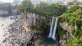 Aerial View of The High Waterfall Jeongbang and Lagoon at Seoqwipo on Jeju Island Royalty Free Stock Photo