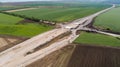 Aerial view of highway construction site. Overpass, highway intersection Royalty Free Stock Photo