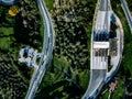 Aerial view of highway, expressway and motorway with a toll payment point in Italy