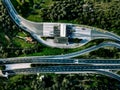 Aerial view of highway, expressway and motorway with a toll payment point in Italy