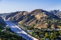 Aerial view of highway 405 with heavy traffic; the hills of Bel Air neighborhood in the background; Los Angeles, California Royalty Free Stock Photo