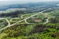 Aerial view of highway interchange. Road junction. Aerial view. Photo with noise from action camera Royalty Free Stock Photo