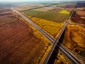 Aerial view of highway interchange of a small city in open space Royalty Free Stock Photo