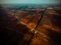 Aerial view of highway interchange of a small city in open space Royalty Free Stock Photo