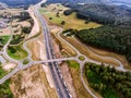 Aerial view of highway junction, green forest, Netherlands